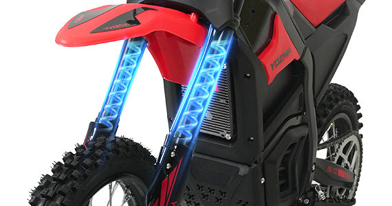 Front Hydraulic Suspension: The robust front suspension system of an off-road e-bike with hydraulic forks, built to handle bumps and rough terrain with ease.

