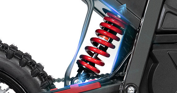 Nitrogen Air Shock Absorber: Close-up of the durable red coil on an electric trail bike with a nitrogen shock absorber, designed for superior off-road comfort.